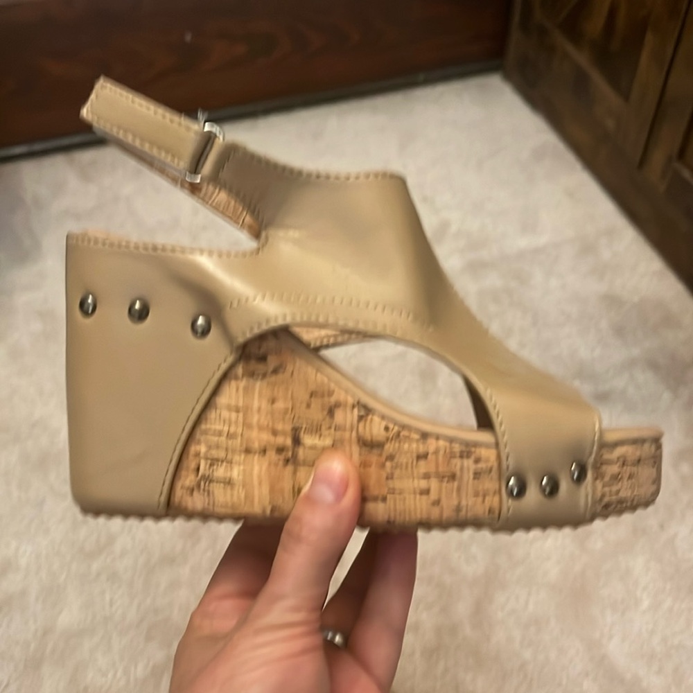 Women's size 37 (6 1/2) tan wedge-heel sandal. New, never been worn.
